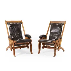 James Herbert McNair, a pair of Gothic Revival oak folding library chairs,, each carved frame with pierced trefoil roundels