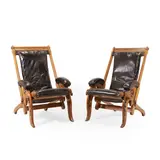James Herbert McNair, a pair of Gothic Revival oak folding library chairs,, each carved frame with pierced trefoil roundels