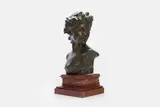 Jef Lambeaux, a bust of a young woman,, raised on a marble plinth
