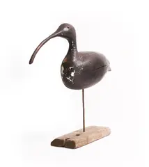 Guy Taplin, Untitled, c.1980 carved and painted driftwood with glass eyes, on a metal and driftwood base 49cm high overall