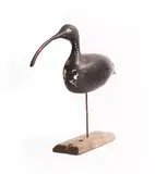 Guy Taplin, Untitled, c.1980 carved and painted driftwood with glass eyes, on a metal and driftwood base 49cm high overall