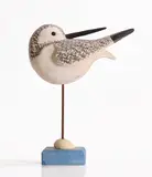 Guy Taplin, Untitled, 'Peep' carved and painted driftwood on a wood and metal base with shell