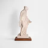 Stanley Nicholson Babb, Untitled, a pottery figure of a female nude holding an oil lamp