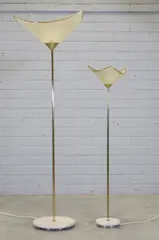 Untitled by Salvatore Gregorietti, each with a fibreglass shade over a brass column and marble plinth, sold Nov 2024