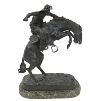 Frederic Remington After, Wooly Chaps, Large and finely executed bronze sculpture on a marble base