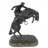Frederic Remington After, Wooly Chaps, Large and finely executed bronze sculpture on a marble base