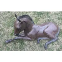 Pat Mathiesen, Untitled, Recumbent foal life size bronze sculpture, signed, dated 1990 and numbered 2 of 10