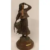 Susan Kliewer, Apache Autumn, Patinated bronze sculpture on a swivel base