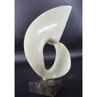 Onyx on stone base by Leonardo Nierman, Abstract sculpture, sold Apr 2023
