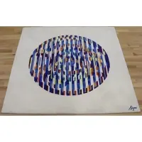 Wool pile tapestry in colors with signature in black wool by Yaacov Agam, sold Mar 2023