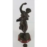 Étienne Henri Dumaige, Raised on a rouge marble base, Bronze sculpture of a beauty playing the tambourine