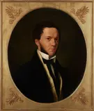 A portrait of a young man; also a companion portrait of an elegant lady (a pair) by American School, both oil on canvas, sold Feb 2020