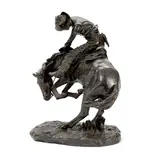 The Rattlesnake (Recast) by Frederic Remington, bronze with dark brown patina, sold Feb 2019