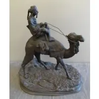 Alexandre Léonard, Alexandre Leonard, French, 1821 - 1877, Bronze of Man on Camelback Signed on base