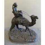 Alexandre Léonard, Alexandre Leonard, French, 1821 - 1877, Bronze of Man on Camelback Signed on base