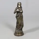 Albert Carrier-Belleuse, - Bronze & Ivory Figure 'Liseuse', A large bronze figure titled 'Liseuse'