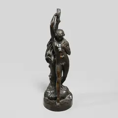 John Henry Foley, 'A Youth At The Stream', a patinated bronze study of a boy leaning against a trunk and dipping a toe in the water