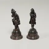 Antonio Pandiani, 'Personaggi', a pair of patinated bronze figures depicting a gentleman in a bicorn hat and a lady holding a fan