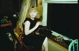 Nan Goldin, 2 Bll.: April in the window. Lynelle in Japanese restaurant, N.Y.C
