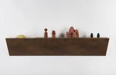 Haim Steinbach, Landscape A-1, 2009, plastic laminated wood shelf with plastic reptile cave, 2 wood and metal Dansk salt and pepper shakers, shale mountain and 2 rubber dog chews