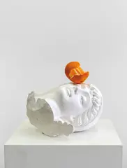 Head (Orange) by Tony Matelli, 2020, plaster, polyurethane, painted bronze and stainless steel, sold Dec 2020