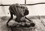 Sebastião Salgado, A Body Being Prepared for Burial, Korem Camp, Ethiopia
