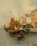 T. Wagner, A Dutch townscene with boats at the quayside; together with two paintings by another hand (a group of three), first, oil on canvas; second and third, oil on panel