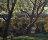 Paul Nietsche, View Of A Church, Lake And Hills Through Trees, Oil on board