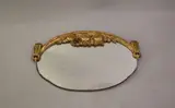 A Mounted Wall Mirror, 129