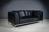 Ligne Roset, A Black Leather Sofa