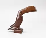 H 22 cm. by Art Deco toekan van mahoniehout + palissander, Art Deco toekan van mahoniehout + palissander, sold Oct 2024