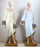 Twee grote figuren, Druivenpluksters, H 166 cm.