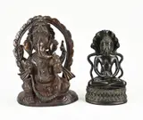 H 19 - 25 cm. by Twee Oosterse bronzen boedha figuren, sold Apr 2023
