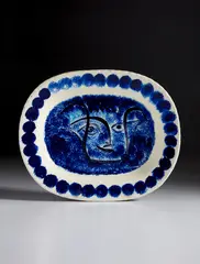 Pablo Picasso, Visage noir putoisé (Speckled black face), 1948, White earthenware rectangular dish, painted in colors and glazed; ceramic, Madoura edition