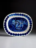 Visage noir putoisé (Speckled black face) by Pablo Picasso, 1948, White earthenware rectangular dish, painted in colors and glazed; ceramic, Madoura edition, sold Dec 2020