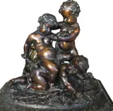 Ernest Auguste Révillon, Bacchus enfant et deux amours, sculpture en bronze à patine brun nuéncé