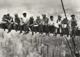 Charles Clyde Ebbets, Lunchtime Atop a Skyscraper, 1932, photograph depicts construction workers seated on a steel beam high above Manhattan