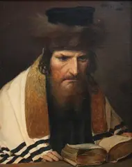 Alois Heinrich Priechenfried, Portrait of a Rabbi reading a Book at a Table, oil on canvas