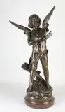 Amor by Groot antiek Frans bronzen figuur op marmeren basement, Groot antiek Frans bronzen figuur op marmeren basement, sold Jul 2021