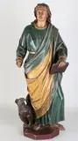 Heilige met adelaar by 19e Eeuws religieus houtgestoken figuur met polychromie, sold Jan 2019