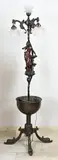 Staande lamp met figuur, H 176 cm., Brons-kleurig gepatineerd