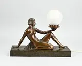 1920 by Art Deco lamp met halfnaakte dame op marmeren basement, Art Deco lamp met halfnaakte dame op marmeren basement, sold Apr 2025