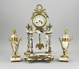 1900 by Antiek drie-delig marmeren klokkenstel, Antiek drie-delig marmeren klokkenstel, sold Apr 2025