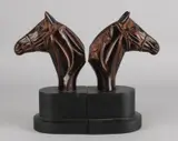 2x Boekensteun, Paardenhoofd., Twee decoratieve boekensteunen met paardenhoofden, metaal, bronskleurig gepatineerd