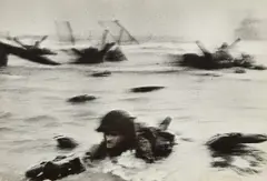 D-Day Landing, Omaha Beach, Normandy by Robert Capa, 1944, Gelatin silver print, probably printed no later than 1954, sold Jul 2020