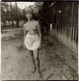 A Waitress in a Nudist Camp in New Jersey by Diane Arbus, 1963, Gelatin silver print, sold Jul 2020