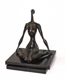 Doris Caesar, Seated nude, bronze on wooden base