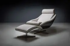 Roche Bobois, A Leather Swivel 'Bakea' Armchair & Stool, attributed to ROCHE BOBOIS