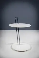 A Side Table by Eileen Gray, sold Apr 2025