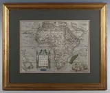Abraham Ortelius, Africae Tabula Nova': detailed map of Africa based upon Gastaldi's 8-sheet wall map and Mercator's world map of 1569, decorated with a strapwork title cartouche, a sea battle in the lower right corner, engraving with hand-colouring